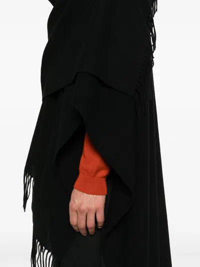 Shop Yohji Yamamoto Fringed Poncho In Black