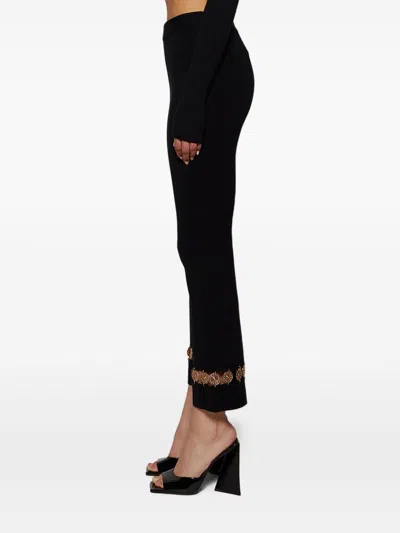 Rabanne Womens Black Plaque-embellished Flared-leg High-rise Wool-blend Knit Trousers In Black