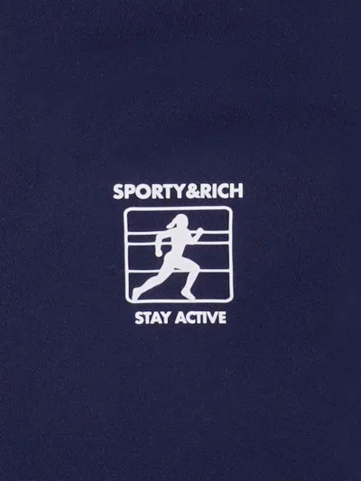 Sporty And Rich Runner Box Leggings In Blue