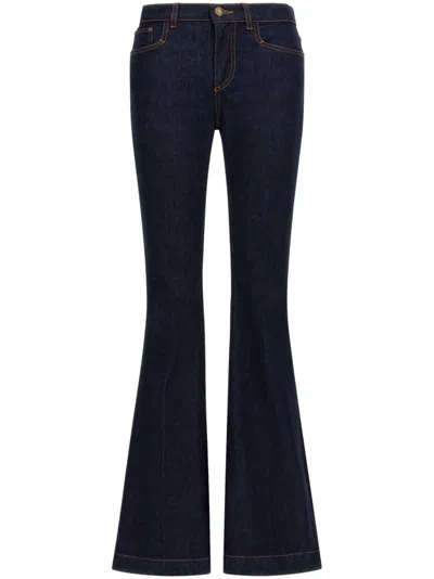 Shop Roberto Cavalli Logo-patch Flared Jeans In Blue