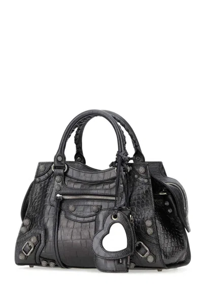 Shop Balenciaga Handbags. In Grey