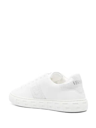 Shop Versace Greca Sequined Sneakers In White