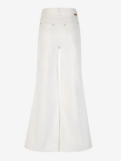 Shop Zimmermann Cotton Flared Jeans In White