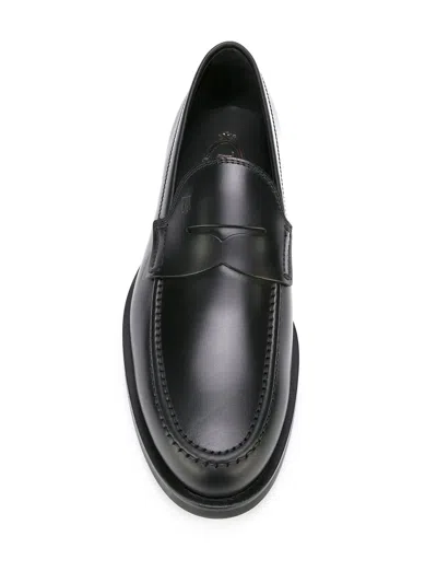 Tod's Smooth Leather Moccasin Loafers With Subtle Stitching