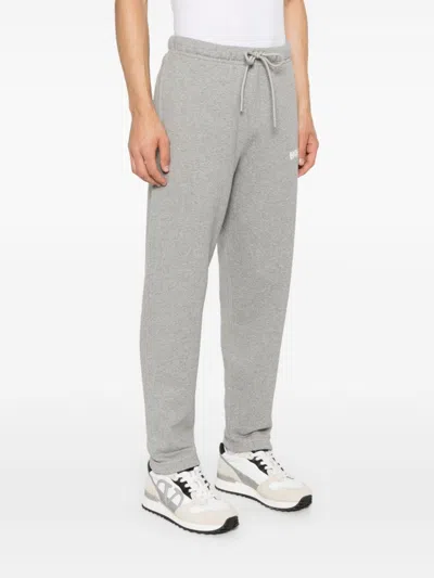 Moncler Logo-embroidered Track Pants In Grey