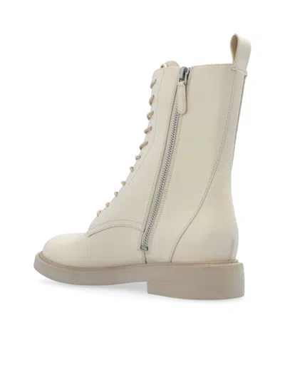 Tory Burch Logo-embossed Leather Boots In Neutrals
