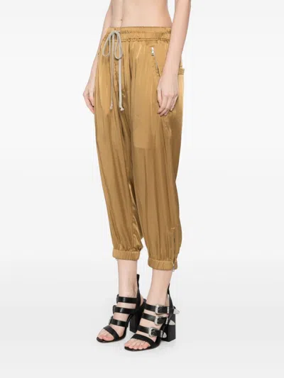 Shop Rick Owens Cropped Track Pants In Gold