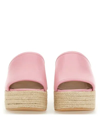 Shop M05ch1n0 Jeans Heeled Mules In Pink