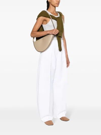 Totême Scooped Sling Leather Shoulder Bag In Neutrals