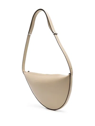 Totême Scooped Sling Leather Shoulder Bag In Neutrals