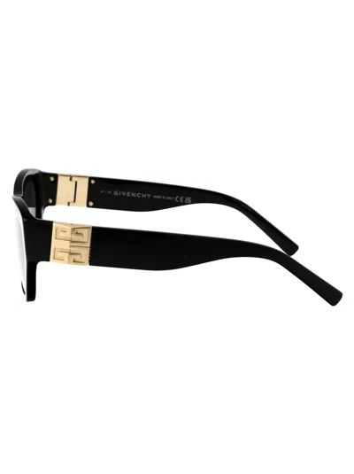 Shop Givenchy 4g Sunglasses In 01a Shiny Black / Smoke