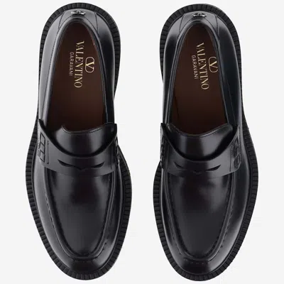 Shop Valentino Leather Loafers In Black