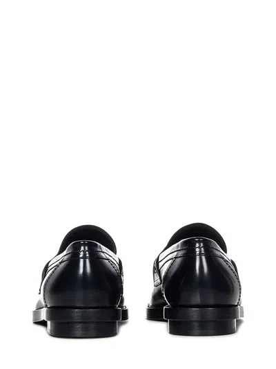 Shop Alexander Mcqueen Seal Leather Loafers In Black