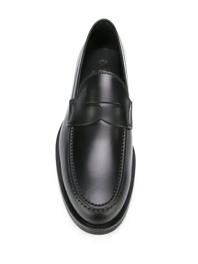 Shop Tod's Leather Loafers In Black