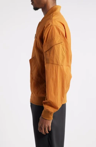 Shop Jordan Essentials Lightweight Nylon Renegade Jacket In Desert Bronze