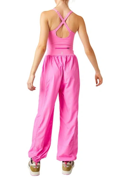 Free People Fp Movement Righteous Runsie Jumpsuit In Magenta Minx