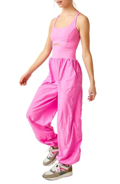 Free People Fp Movement Righteous Runsie Jumpsuit In Magenta Minx