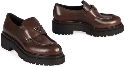 Shop Prada Logo Detail Leather Loafers In Brown