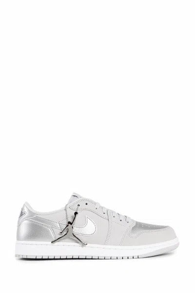 Shop Nike Unisex Silver Sneakers