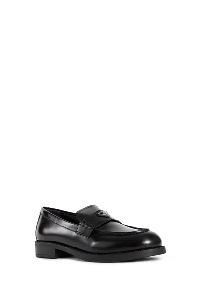 Prada Leather Loafers With Decorative Buckle And Round Toe In Black