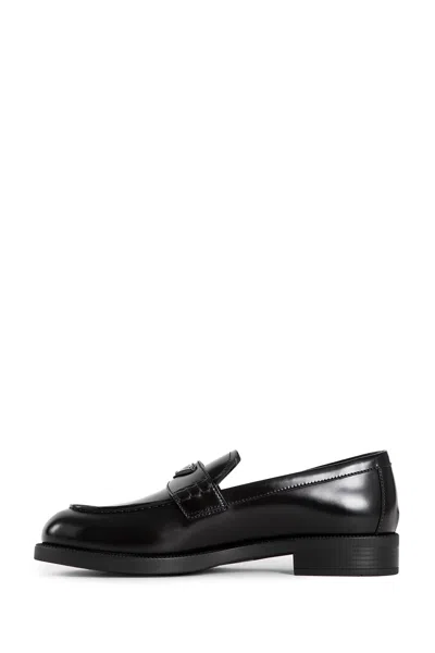 Prada Leather Loafers With Decorative Buckle And Round Toe In Black