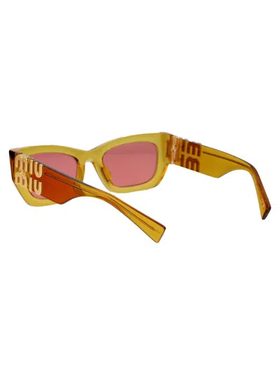 Miu Miu 0mu 09ws Sunglasses In 12t1d0 Orange Transparent