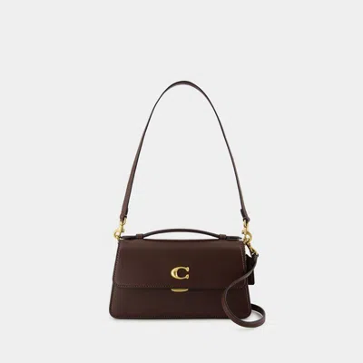 Coach In Brown