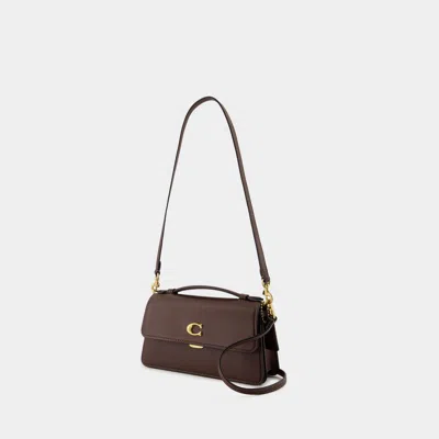 Coach In Brown