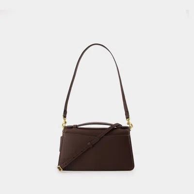 Coach In Brown