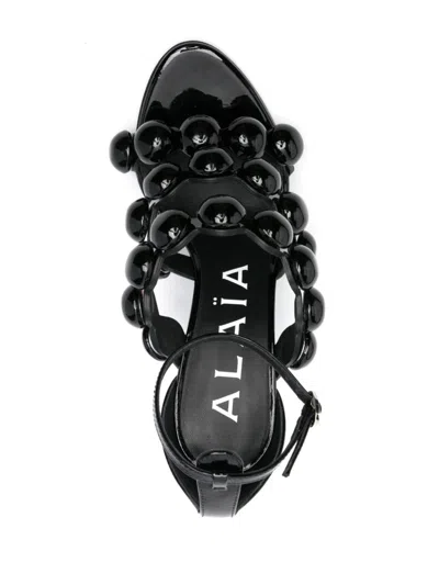 Shop Alaïa Alaia Leather Heel Sandals