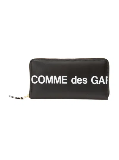 Comme Des Garçons Continental Wallet With Bold Logo Print In Black