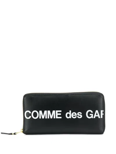 Comme Des Garçons Continental Wallet With Bold Logo Print In Black
