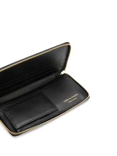 Comme Des Garçons Continental Wallet With Bold Logo Print In Black