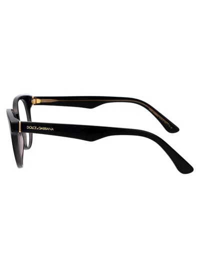 Dolce & Gabbana Round Frame Glasses In 3246 Black/transparent Grey