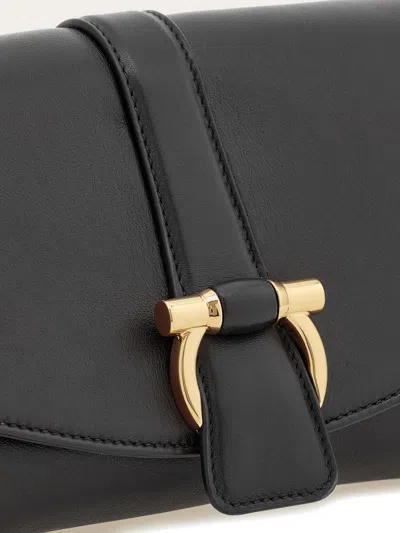 Ferragamo Black Crossbody Bag With Gancini Buckle Detail In Leather Woman In Black
