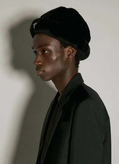 Prada Logo Plaque Shearling Hat In Black