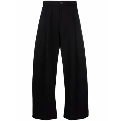 Shop Studio Nicholson Pants In Black