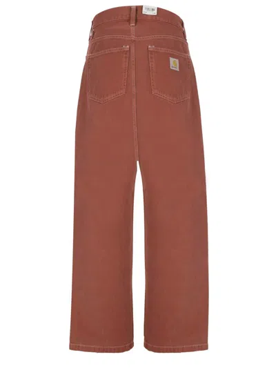 Shop Carhartt Wip Jeans In Tuscany Stone Dyed