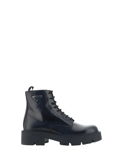 Prada Logo-plaque Panelled Ankle Boots In Black