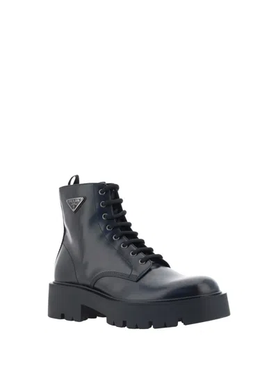 Prada Logo-plaque Panelled Ankle Boots In Black