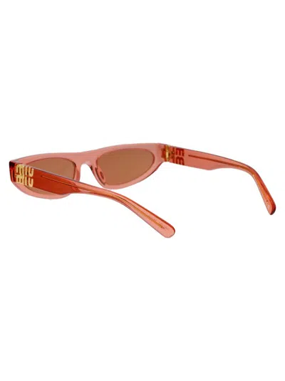 Miu Miu 0mu 07zs Sunglasses In 14t07v Tulip Transparent