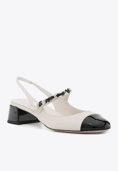 Miu Miu Embellished Leather Slingback Pumps In Ivory