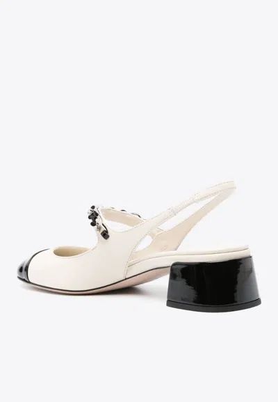 Miu Miu Embellished Leather Slingback Pumps In Ivory