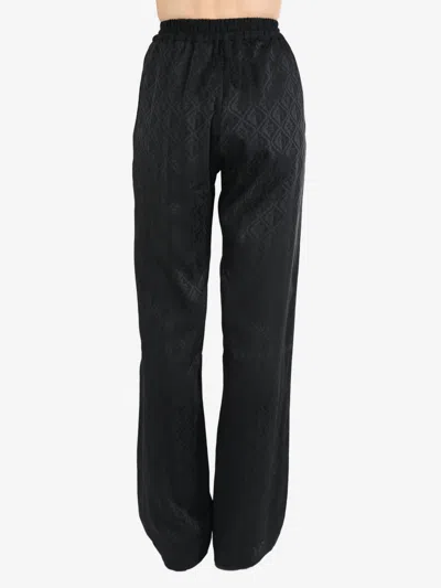 Marine Serre Moon-print Flared Trousers In Bk99 Black
