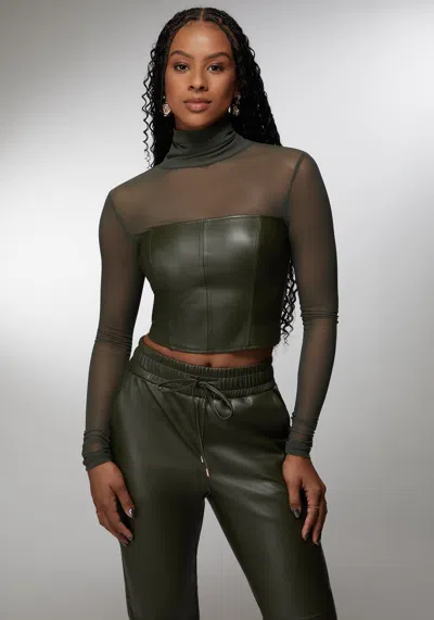 Bebe X Ciara Mock Neck Mesh Combo Vegan Leather Top In Olive