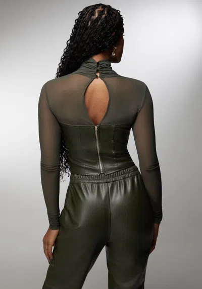 Bebe X Ciara Mock Neck Mesh Combo Vegan Leather Top In Olive