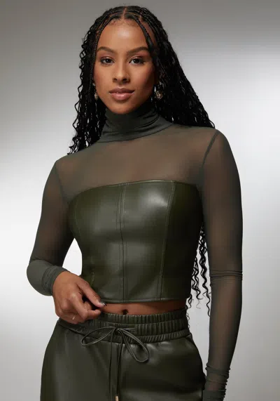 Bebe X Ciara Mock Neck Mesh Combo Vegan Leather Top In Olive