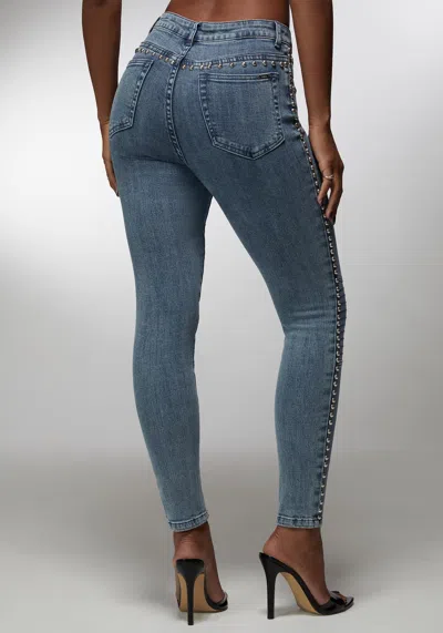 Bebe X Ciara Natural Waist Studded Skinny Jean In River Blue Wash