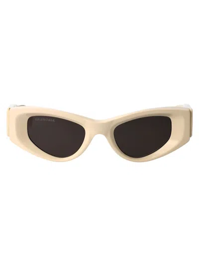 Shop Balenciaga Sunglasses In 003 Beige Beige Grey