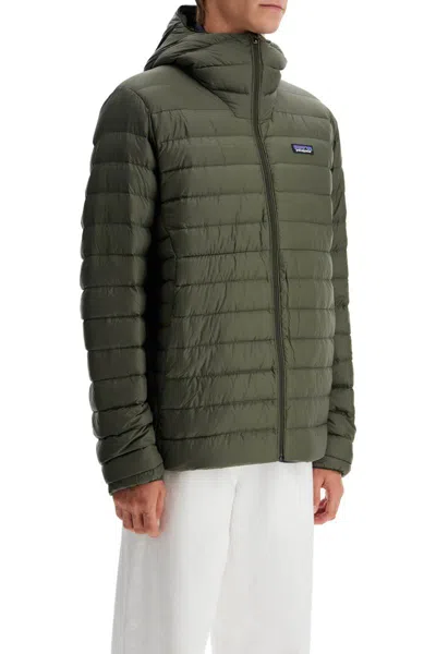 Shop Patagonia Down-filled Hooded Sweater In Green